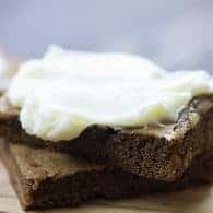 These soft and chewy gingerbread cookie bars are the perfect treat for Christmas!
