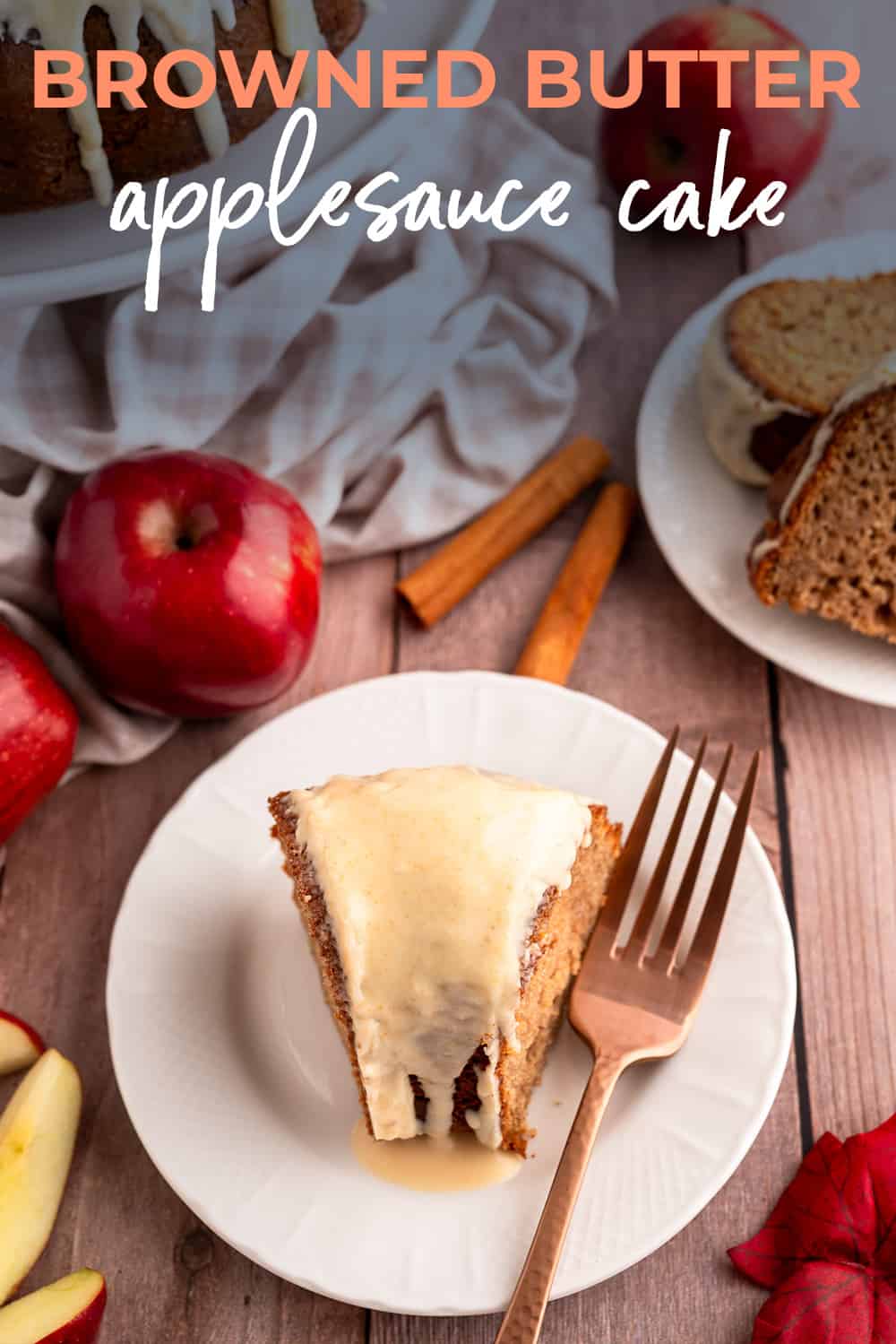 Slice of applesauce bundt cake on plate.