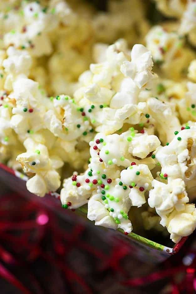 A close up of a popcorn dish topped with sprinkles.