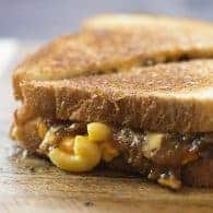 This grilled cheese sandwich is loaded with bbq pulled pork and macaroni and cheese!