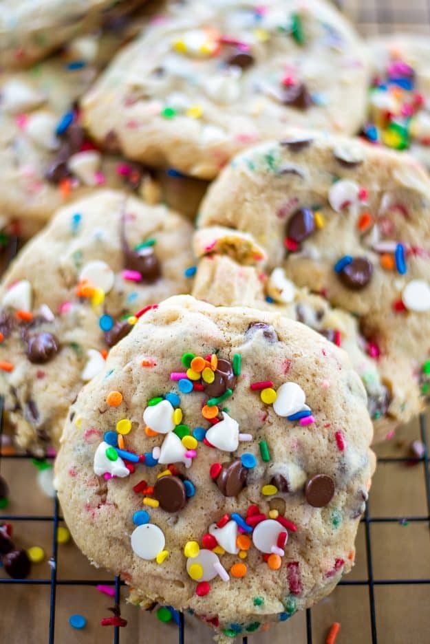 cake batter cookies with sprinkles on wire cooling rack.