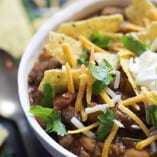 A close up of a bowl of taco chili.