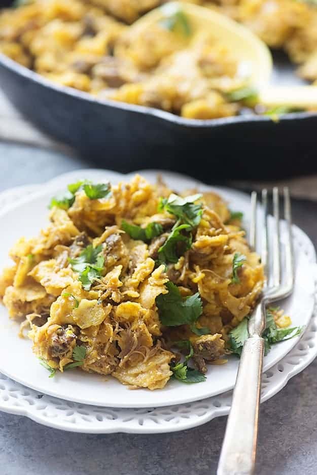 A plate of chilaquiles on a table.