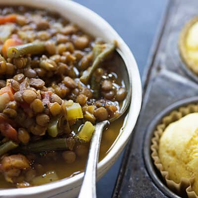 This lentil soup recipe is loaded with fresh veggies and makes a really hearty and healthy dinner!
