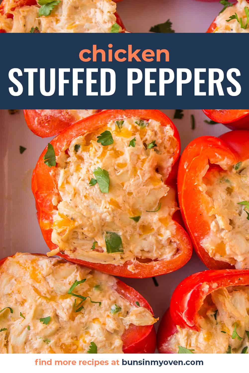Chicken stuffed peppers in baking dish.