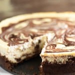 A close up of a chocolate swirl cheesecake.