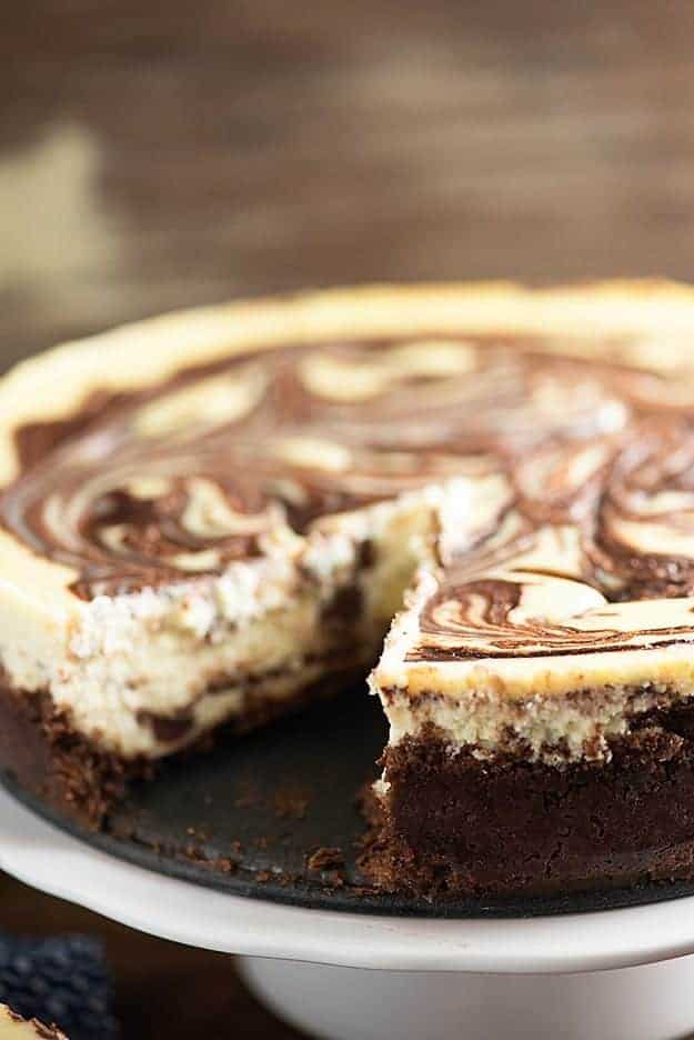 A close up of a chocolate swirl cheesecake.