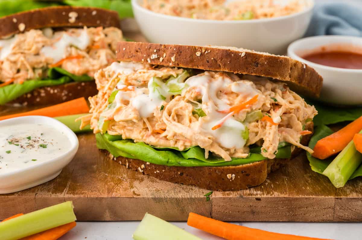 chicken salad on wheat bread with celery and lettuce