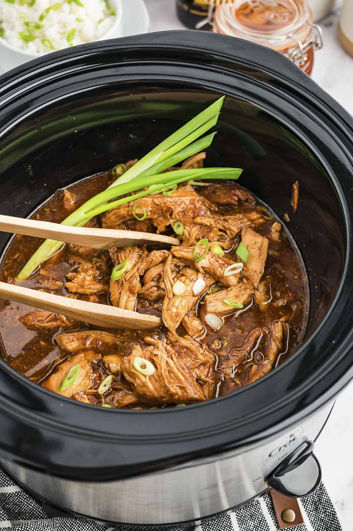 This slow cooker Chinese bourbon chicken is seriously good stuff. We love it served over rice!