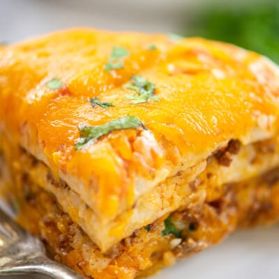 layered burrito casserole on plate.