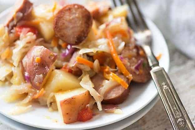This sausage and cabbage recipe is packed with smoked sausage and potatoes and tossed in a tangy sauce! 
