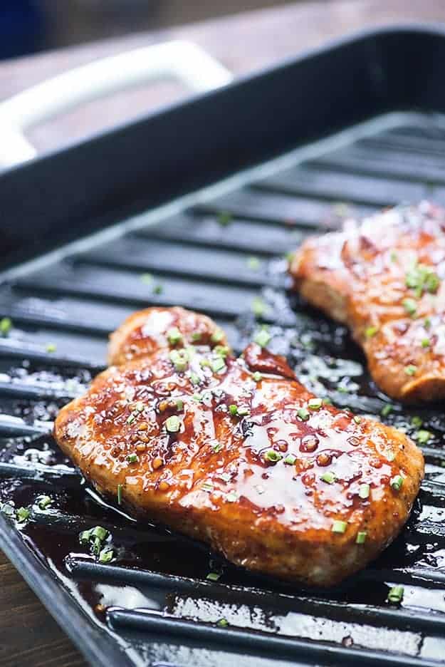 These grilled pork chops are slathered in a simple homemade Korean BBQ sauce that really packs a ton of flavor! Sweet, salty, and savory with just a little bit of spice. You're going to love this grilled pork chop recipe!!