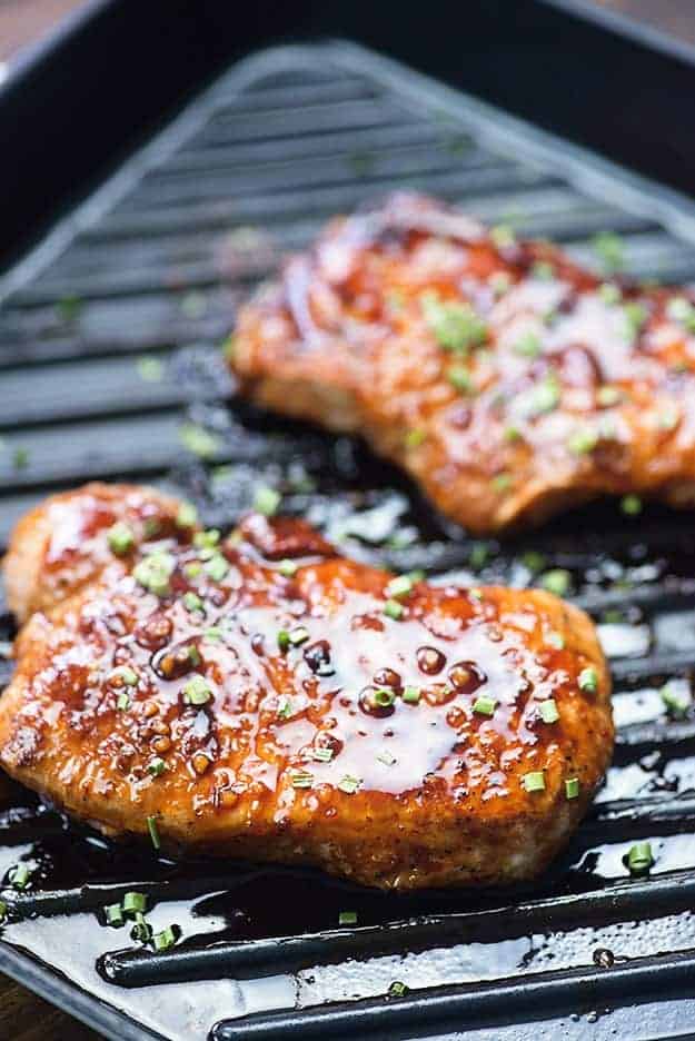 These grilled pork chops are slathered in a simple homemade Korean BBQ sauce that really packs a ton of flavor! Sweet, salty, and savory with just a little bit of spice. You're going to love this grilled pork chop recipe!!