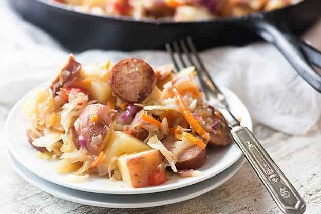 This fried cabbage recipe is packed with smoked sausage and potatoes and tossed in a tangy sauce! 