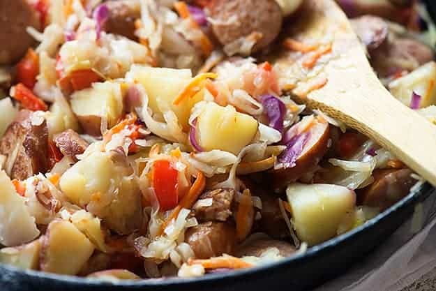 This cabbage and sausage recipe is packed with smoked sausage and potatoes and tossed in a tangy sauce! 