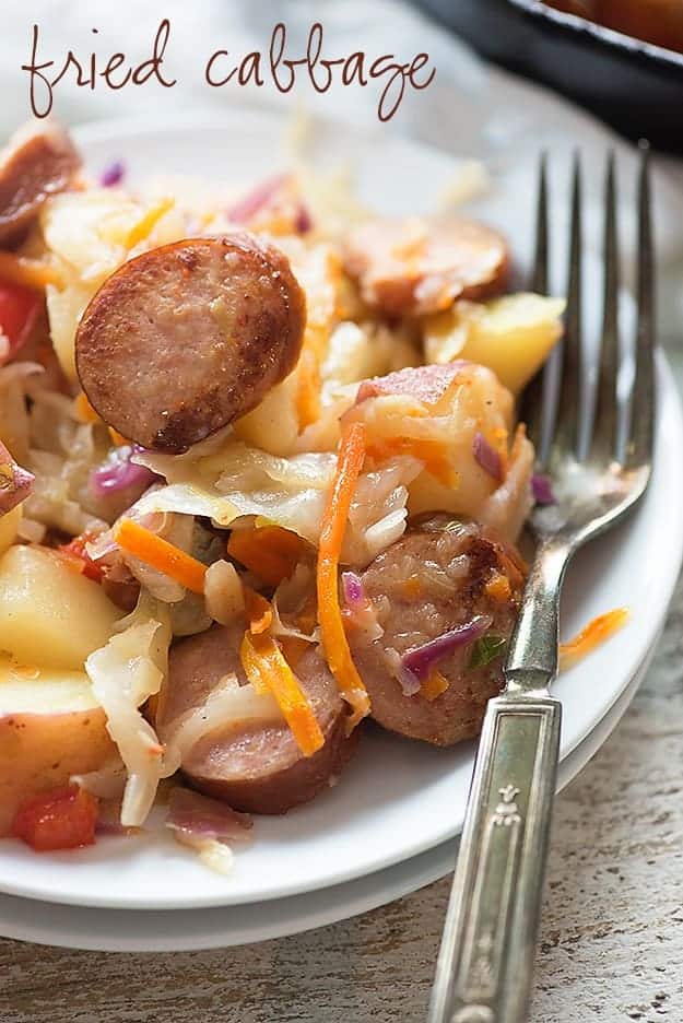 This fried cabbage is packed with smoked sausage and potatoes and tossed in a tangy sauce! 