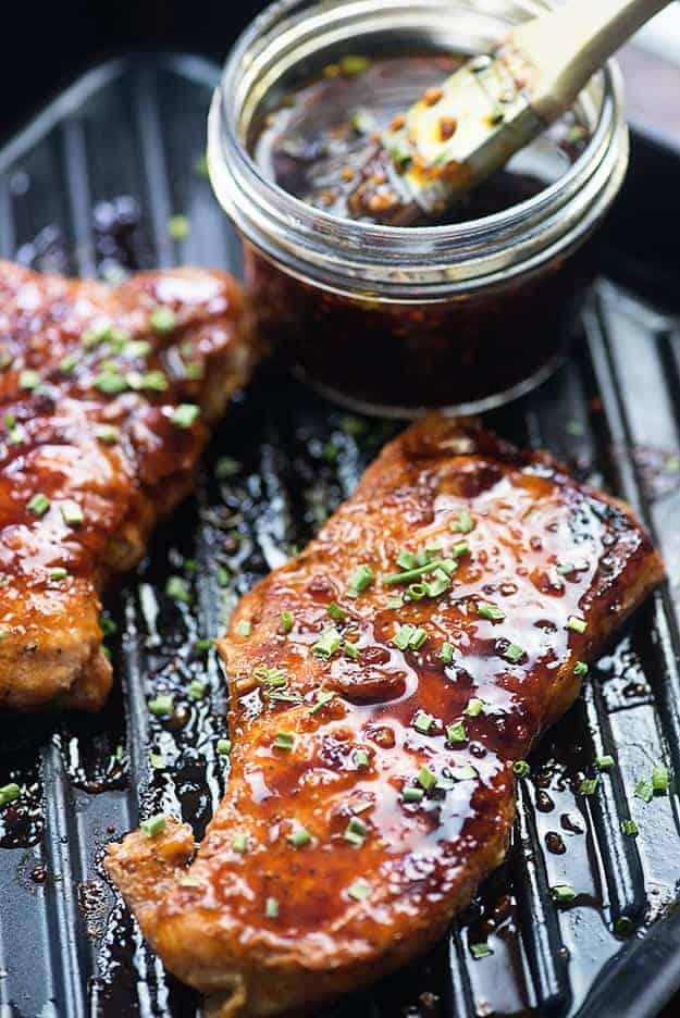 These grilled pork chops are slathered in a simple homemade Korean BBQ sauce that really packs a ton of flavor! Sweet, salty, and savory with just a little bit of spice. You're going to love this grilled pork chop recipe!!