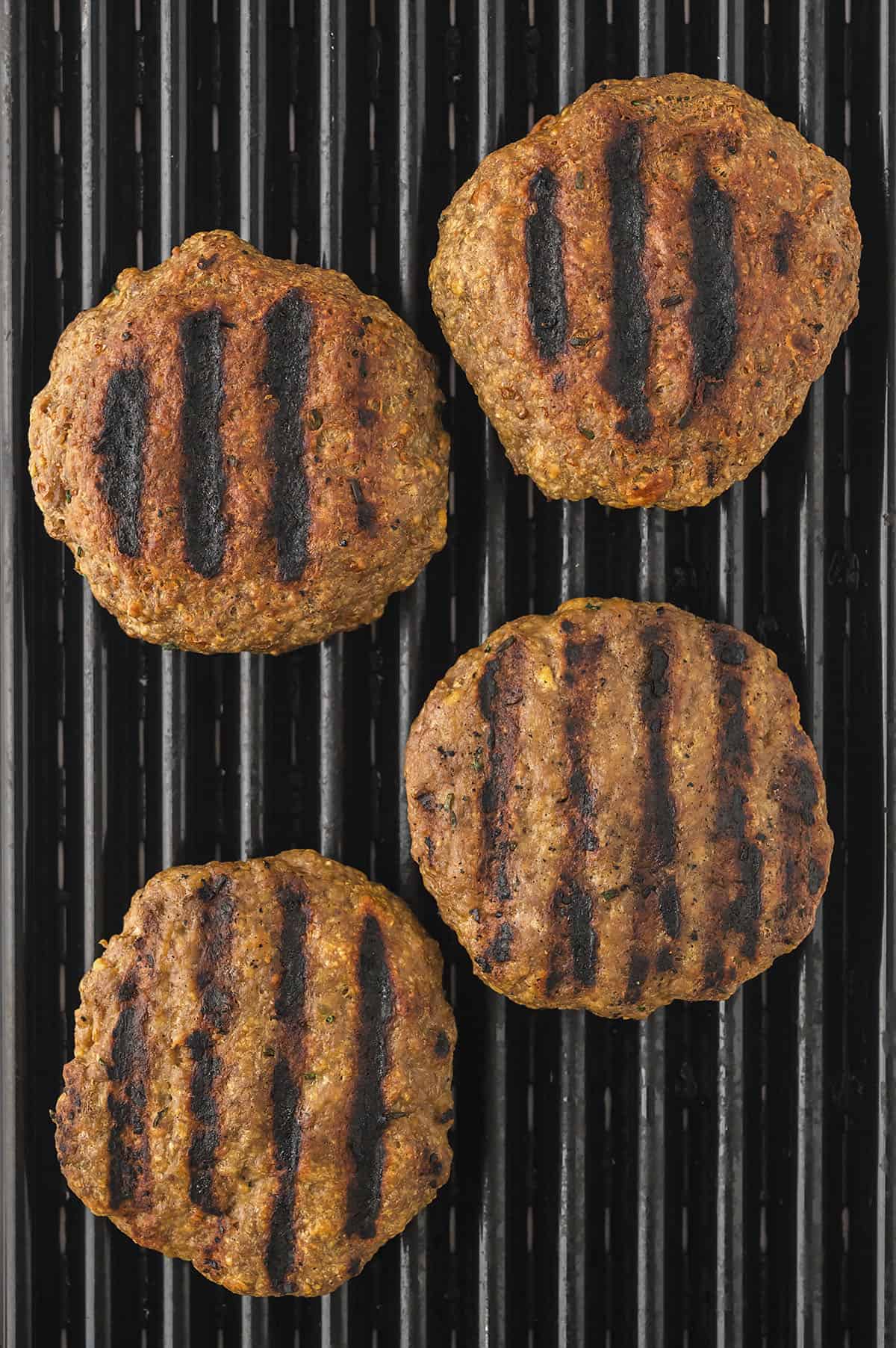 Turkey burgers on grill.