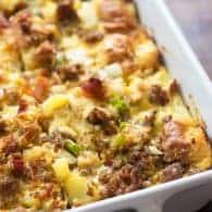 This breakfast casserole recipe is packed with sausage, bacon, cheese, and eggs! It's so simple to throw together before bed and bake in the morning.