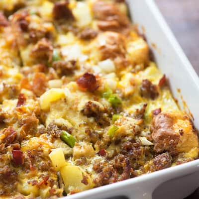 This breakfast casserole recipe is packed with sausage, bacon, cheese, and eggs! It's so simple to throw together before bed and bake in the morning.