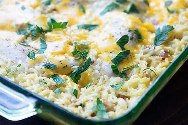 Chicken and rice casserole in a baking pan.