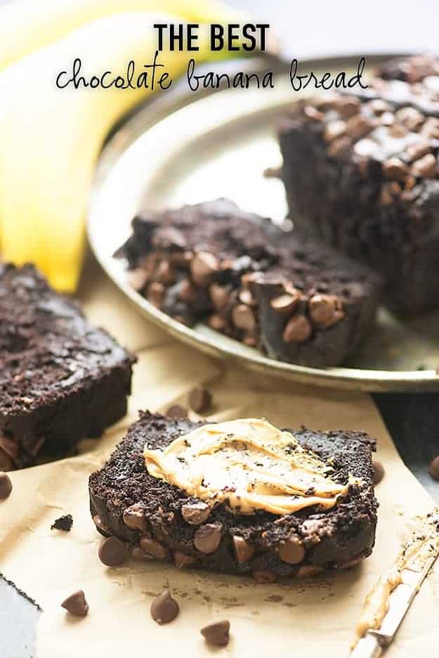 Double chocolate banana bread slice spread with peanut butter.