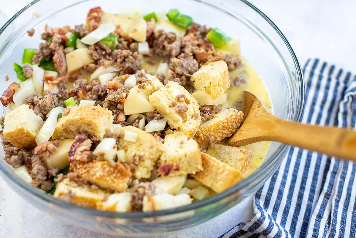 ingredients for breakfast casserole in mixing bowl.