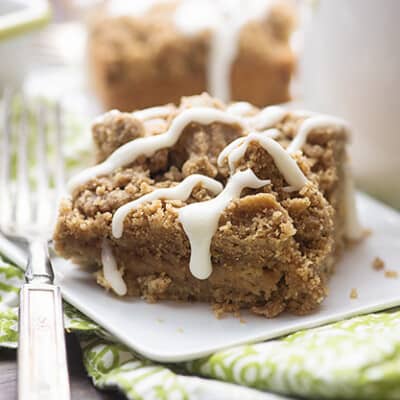 This banana coffee cake recipe is bursting with banana flavor! It's topped off with an extra thick layer of streusel!