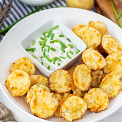 mashed potato puffs in white bowl with ranch.