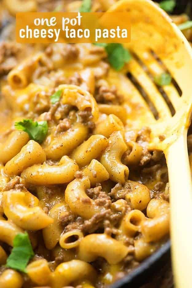 A close up of macaroni and cheese with ground beef.