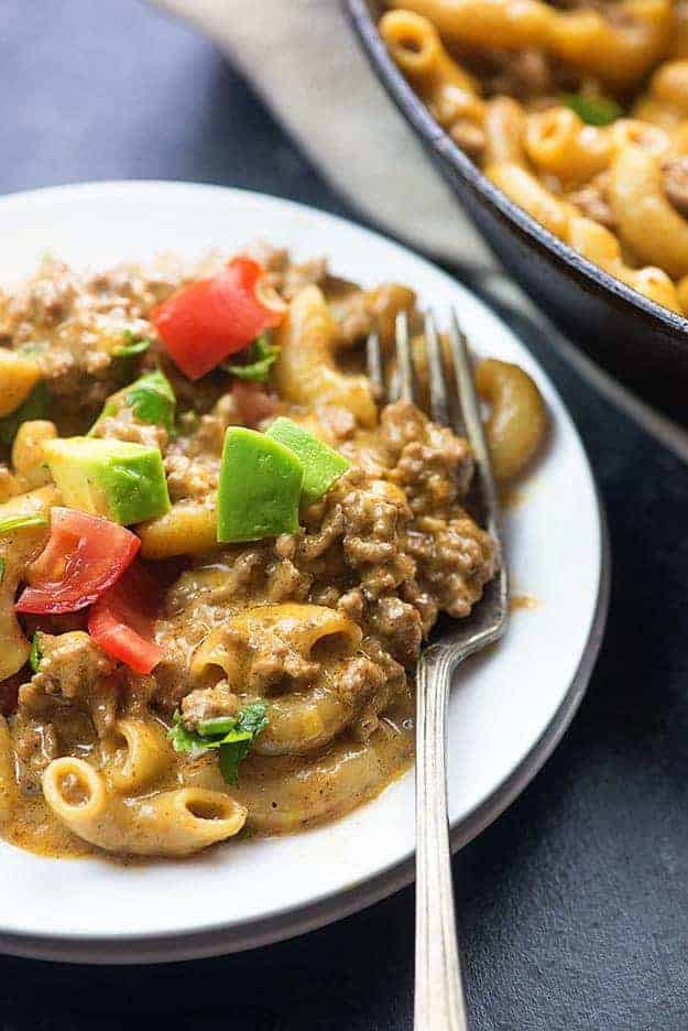 A white plate of taco pasta.