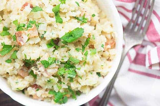 If you've ever wondered how to make risotto low carb, you're going to love this cauliflower risotto recipe! It's one of my favorite low carb side dishes!