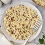 Cauliflower risotto on white plate.