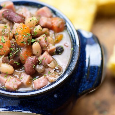 This ham and bean soup is one of my favorite pressure cooker recipes! This Instant Pot soup tastes like it cooked all day, but it's ready in less than two hours!