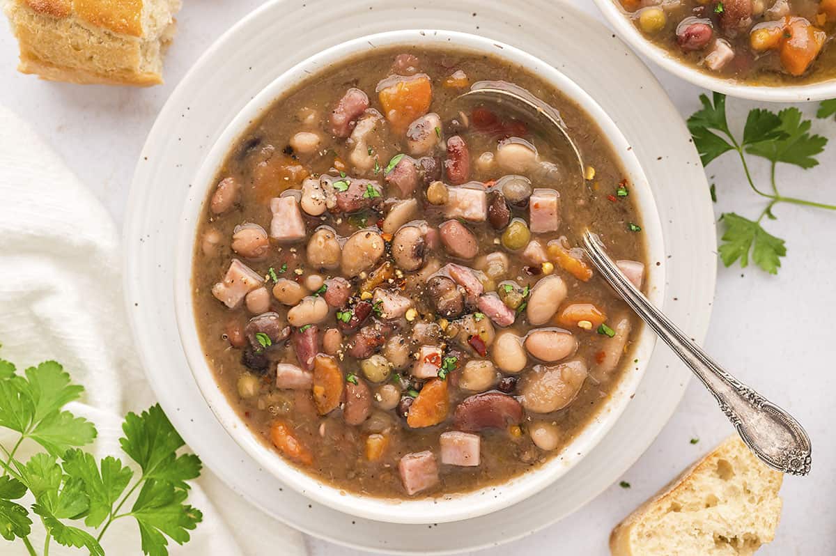 ham and bean soup in blue crock