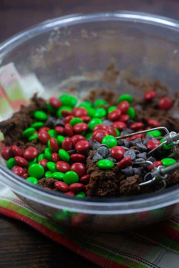 ingredients for chocolate christmas cookies in glass mixing bowl