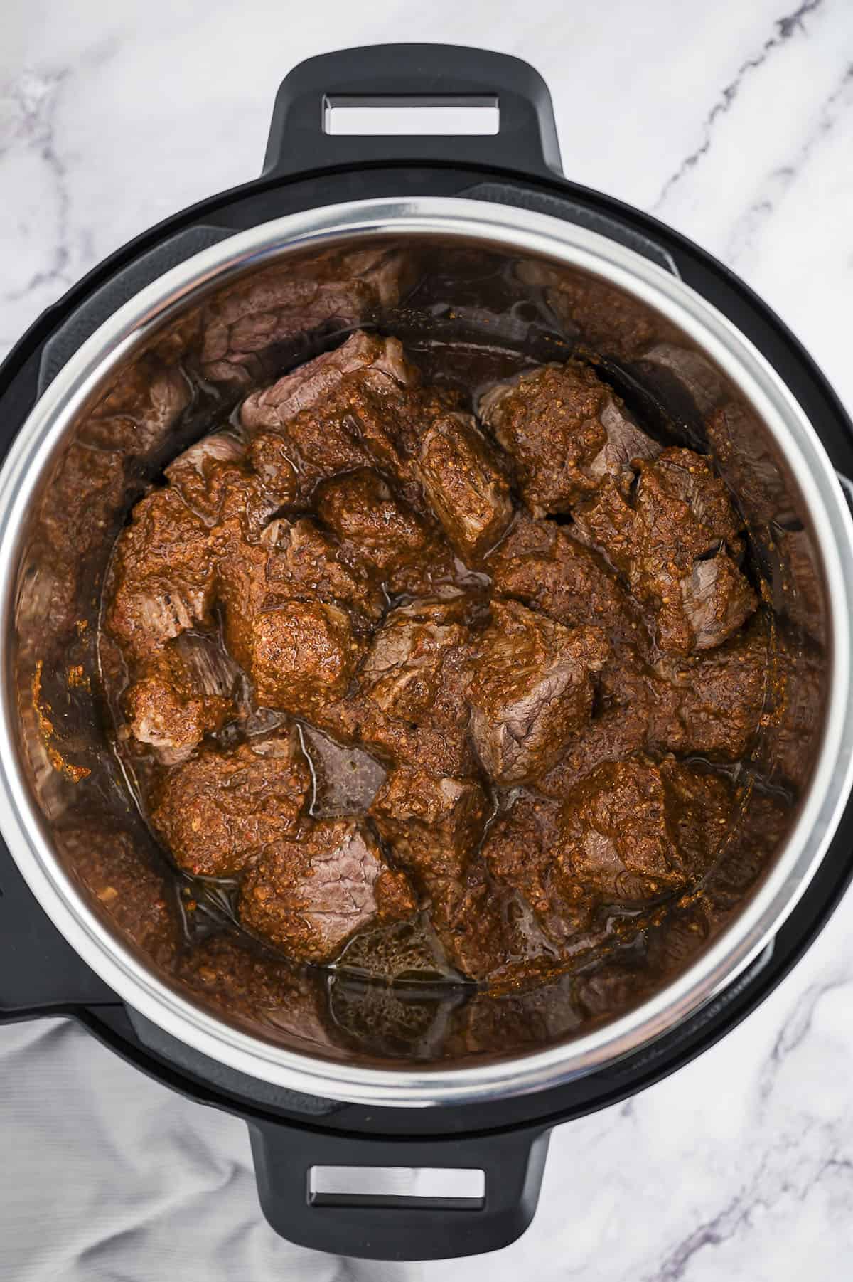 Ingredients for beef barbacoa in Instant Pot.