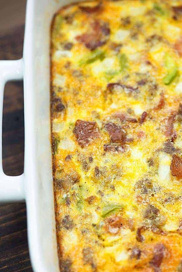 We love this make ahead breakfast casserole! It's naturally low carb and packed with bacon and sausage.