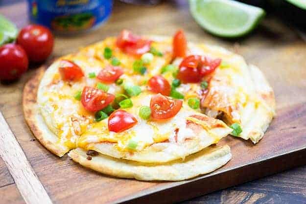 We love to serve this Mexican pizza recipe at the big game. Makes a great snack or appetizer.