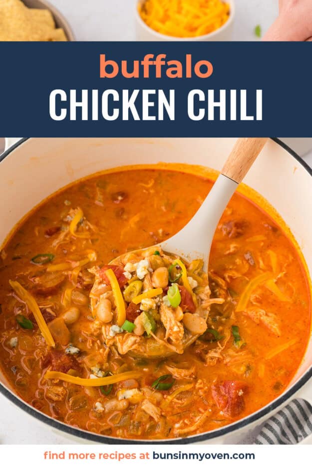 Buffalo chicken chili recipe in pot on ladle.