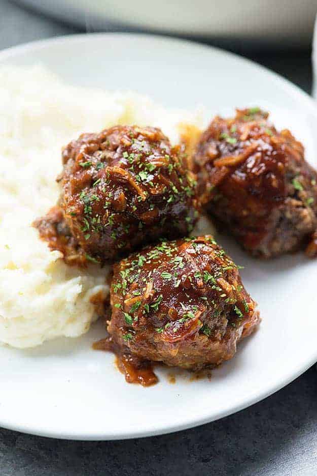 Hello, comfort food! Barbecue meatballs served over mashed potatoes. So good!