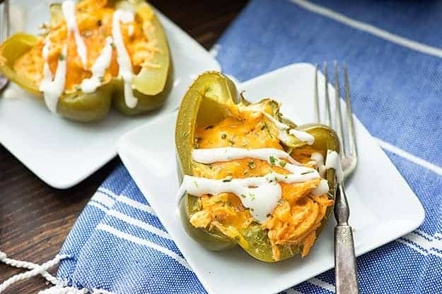 Low carb stuffed peppers filled with buffalo chicken! Perfect for a keto or low carb diet!