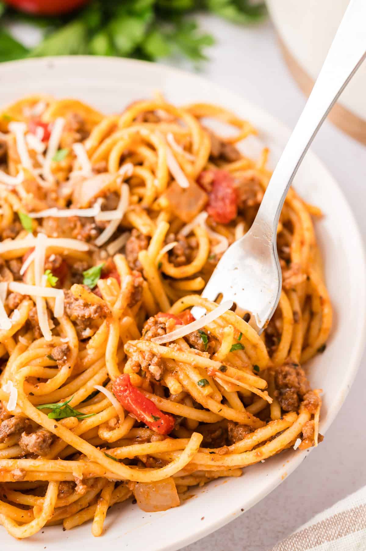 homemade spaghetti recipe in white pot.