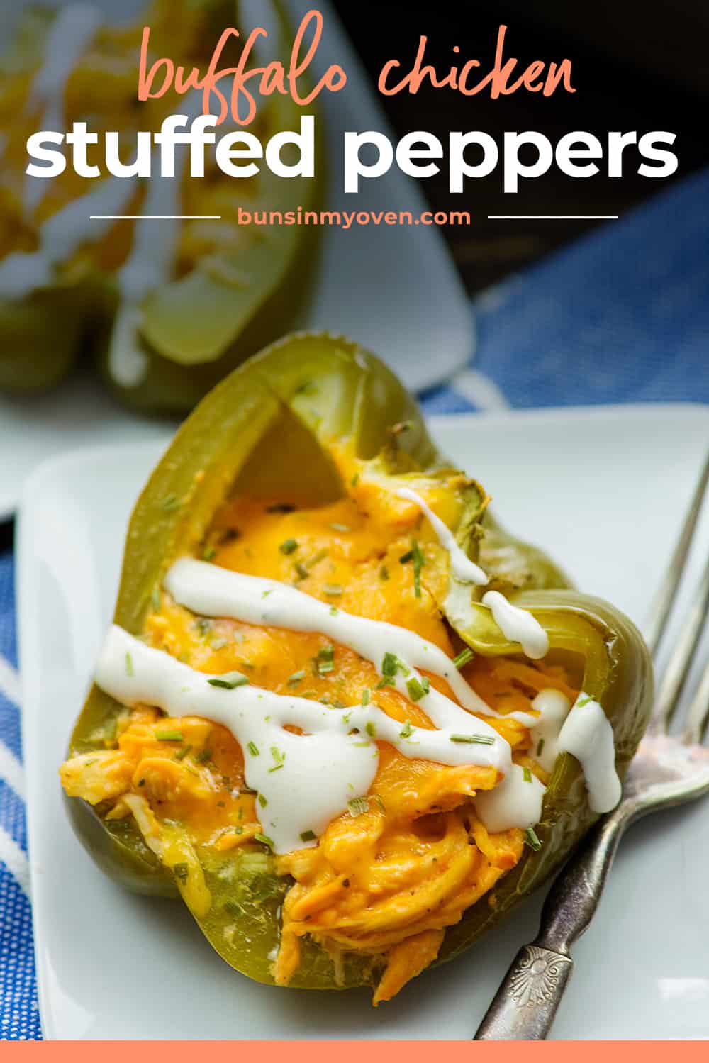 Buffalo stuffed pepper on white plate.