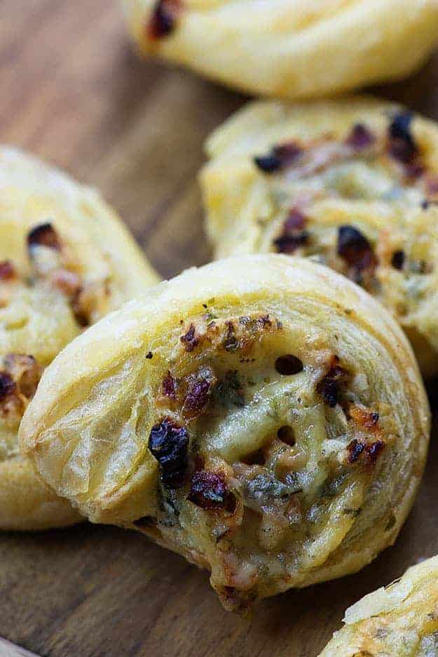Super flaky puff pastry filled with sun-dried tomatoes and creamy cheese.