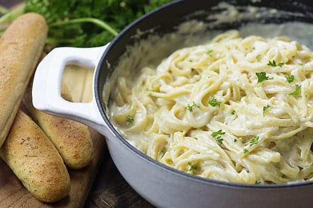 garlic alfredo sauce over pasta