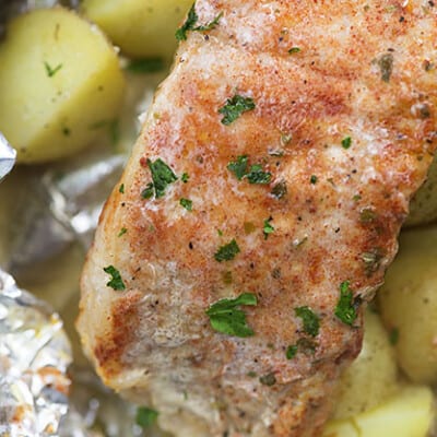 baked pork chops and potatoes in foil packet