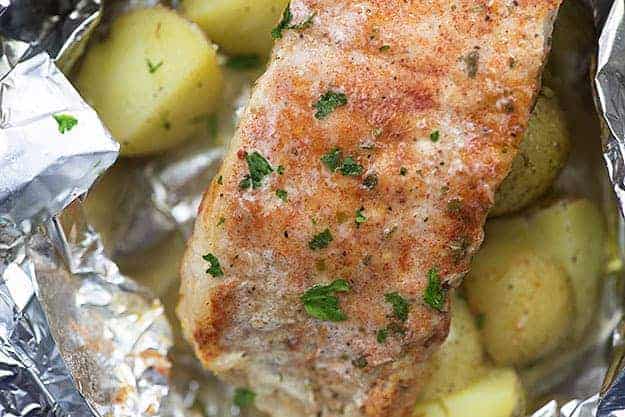 baked pork chops and potatoes in foil packet