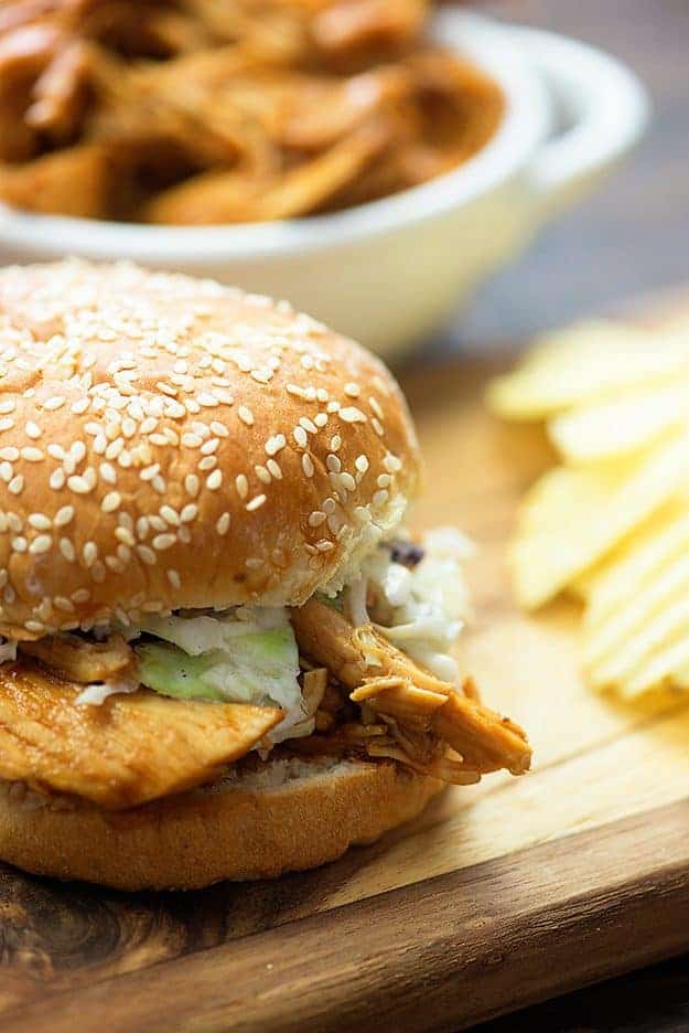 close up of crockpot bbq chicken on a bun