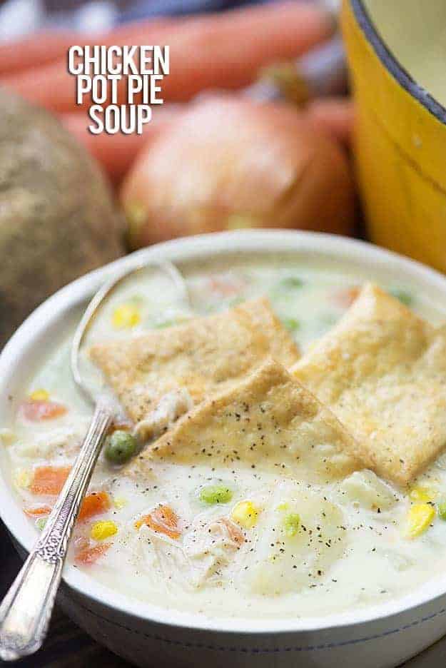 chicken pot pie soup in white bowl